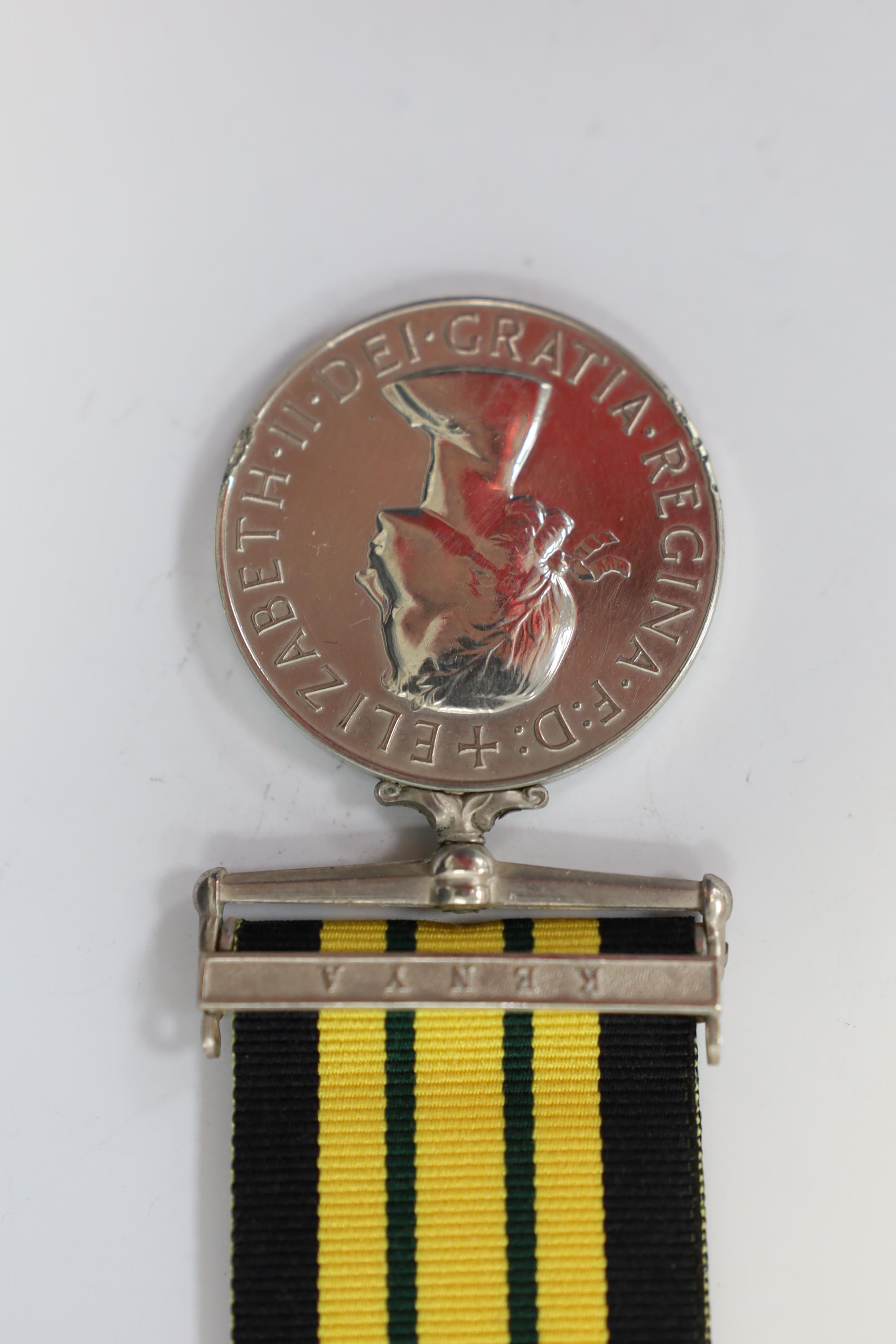 A QEII Africa General Service medal with Kenya clasp to 23200805 Pte. F.Sewell. Glosters.